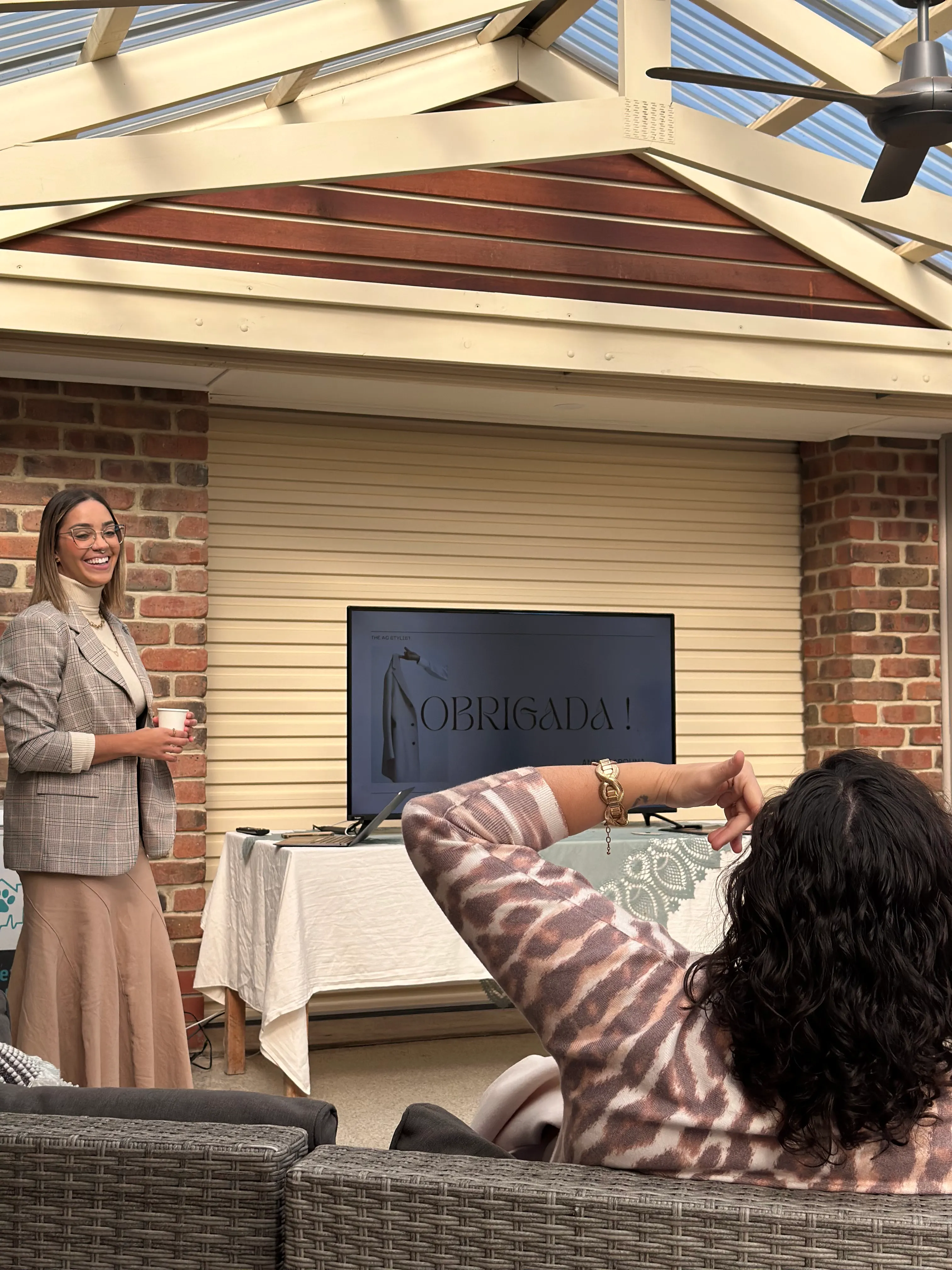 Anna on stage during a speaking event
